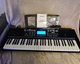 Donner DEK-610 61-Key Electronic Piano Keyboard Beginner Set with Mic & Manual